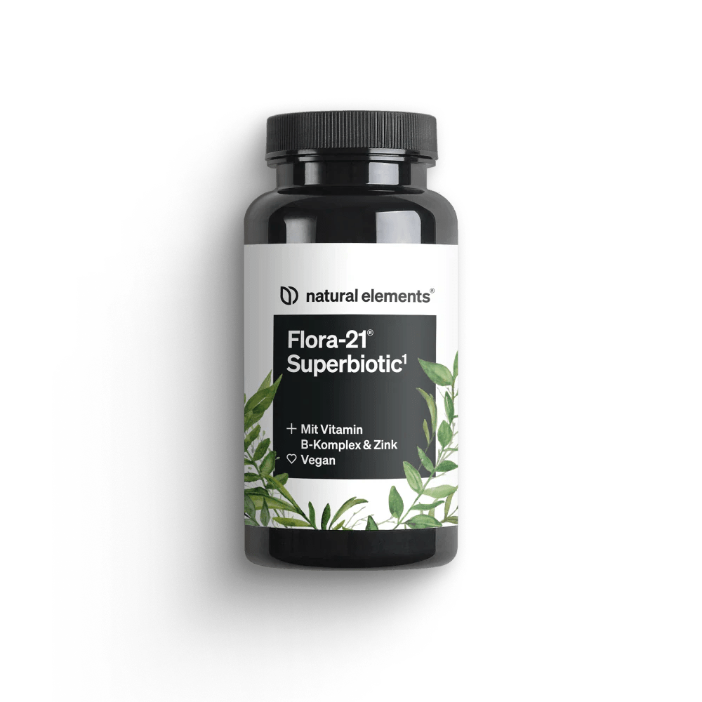 Eine schwarze Flasche mit der Aufschrift „Flora-21® Superbiotic“ von NATURAL ELEMENTS mit grünem Blattmotiv. Enthält Vitamin B-Komplex und Zink. Für Veganer geeignet.