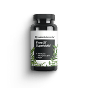 Eine schwarze Flasche mit der Aufschrift „Flora-21® Superbiotic“ von NATURAL ELEMENTS mit grünem Blattmotiv. Enthält Vitamin B-Komplex und Zink. Für Veganer geeignet.