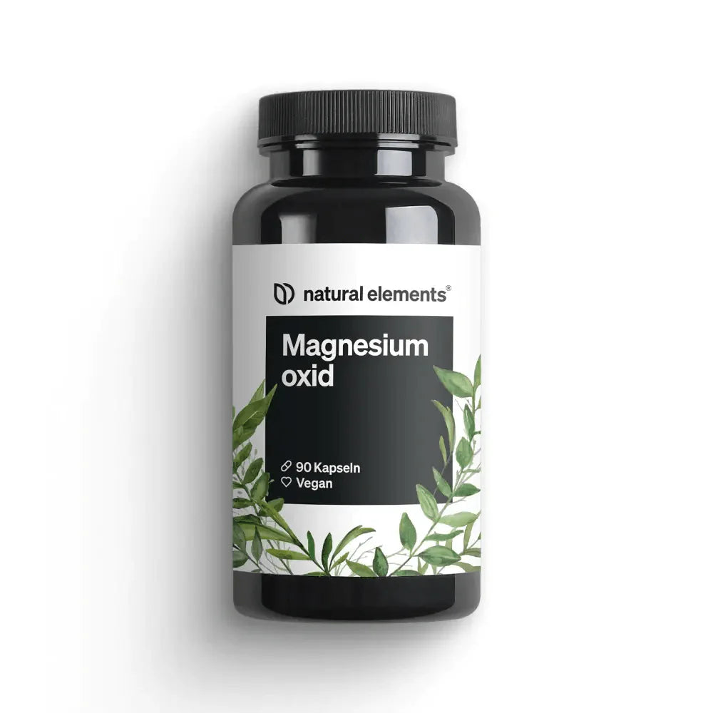 Die schwarze Flasche mit der Aufschrift „Magnesiumoxid Kapseln“ von NATURAL ELEMENTS mit grünem Blättermotiv enthält 90 vegane Kapseln zur Unterstützung der Knochengesundheit.